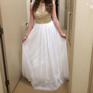 Floor length gold and white dress